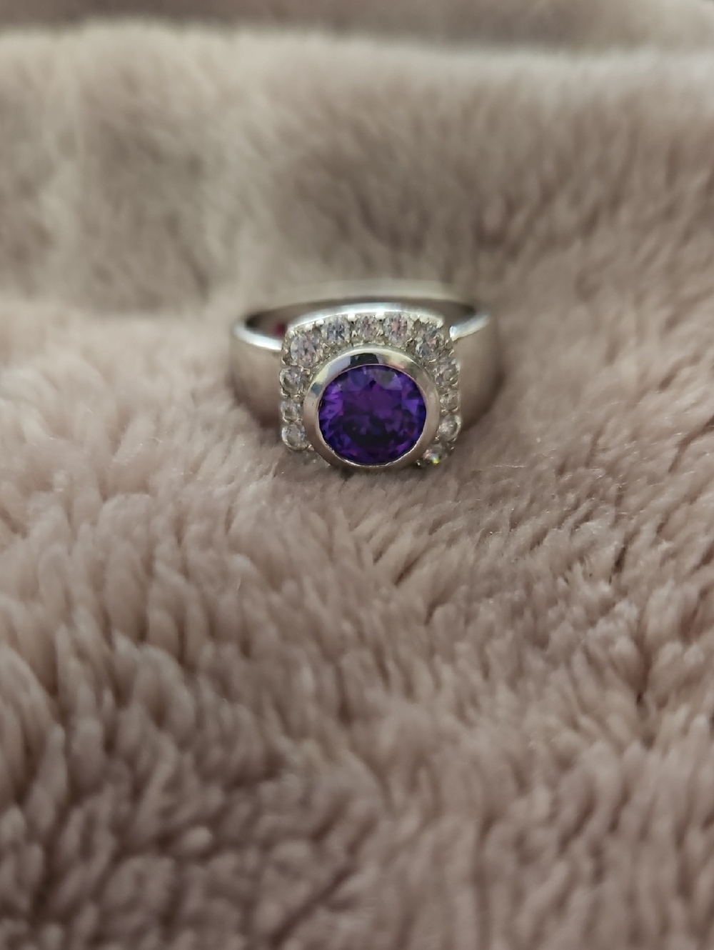 Sterling Silver Ring with Purple Center Stone and Halo